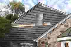 Before image of a home exterior carpentry painting by Two-Day Painting in Waukesha, Wisconsin.