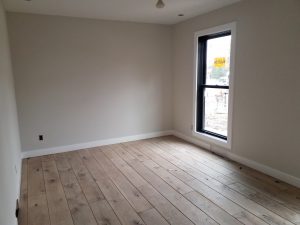 Freshly-painted beige wall inside of a home