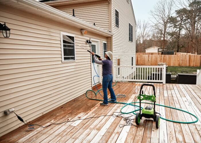 Pressure Washing the exterior of the House